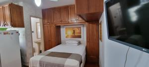 Cama o camas de una habitación en Apartamento em Tramandaí