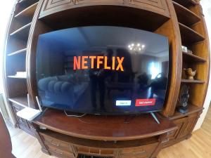 a television with the words netflix on the screen at F C Tiranë in Tirana