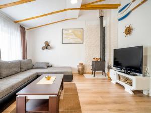 Et tv og/eller underholdning på House Green Oaza