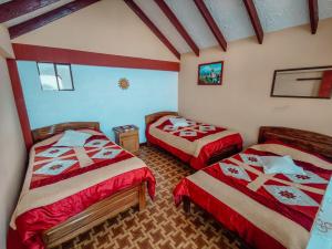 Postel nebo postele na pokoji v ubytování MIRADOR DEL INCA