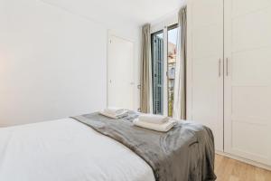 Postel nebo postele na pokoji v ubytování Sagrada Familia Avenida Gaudi Views&cozy Lounge