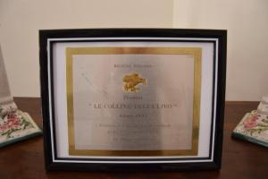 Certifikát, hodnocení, plakát nebo jiný dokument vystavený v ubytování Da Poldino