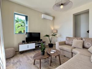 A television and/or entertainment centre at Villa Penelope Spartia Kefalonia