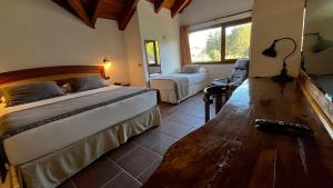 Ein Bett oder Betten in einem Zimmer der Unterkunft Hotel Pucon Green Park