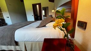 Cama o camas de una habitación en Hotel Pucon Green Park