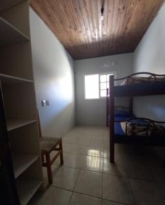 Postel nebo postele na pokoji v ubytování Hostchê compartilhados