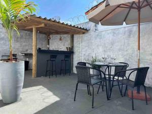 Patio nebo venkovní prostory v ubytování Acolhedora casa de 03 quartos