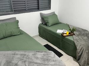 Posezení v ubytování Acolhedora casa de 03 quartos