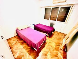 Katil atau katil-katil dalam bilik di PICCOLINO ALOJAMIENTO COMPARTIDO en Recoleta