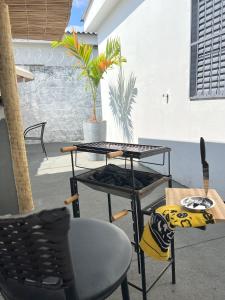 Posezení v ubytování Acolhedora casa de 03 quartos
