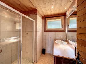 a bathroom with a shower and a sink at Chalet 8 couchages à Combloux, Hiver à la saison, Été à la semaine - FR-1-560-32 in Combloux +14 photos