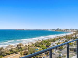 a view of the beach from the balcony of a condo at Beach on Sixth in Maroochydore