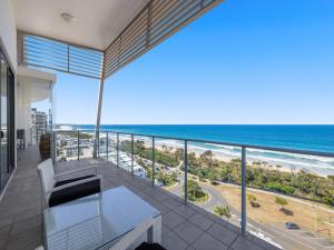 a view of the ocean from the balcony of a house at Beach on Sixth in Maroochydore