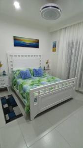 Postel nebo postele na pokoji v ubytování Confortable apartamento en Playa Nueva Romana