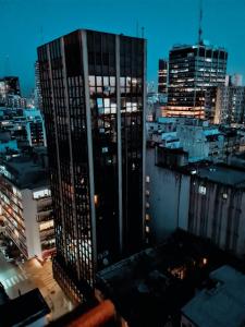 a view of a city skyline at night at Microcentro Monoambiente Vista in Buenos Aires