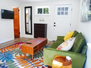 a living room with a couch and a coffee table at Private Studio - King Bed - Wifi in Arvada