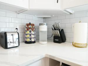 a kitchen counter with a toaster and a toaster at Private Studio - King Bed - Wifi in Arvada +8 photos