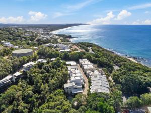 an aerial view of a resort near the ocean at Papillon Coolum in Coolum Beach