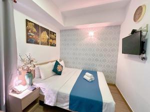 Postel nebo postele na pokoji v ubytování KT MERAKI BOUTIQUE - Bui vien walking street