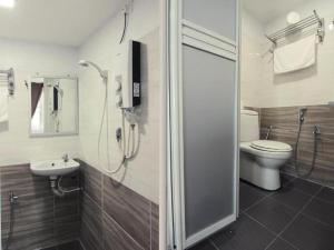 Kúpeľňa v ubytovaní Room V Jalan Megat by SECOM