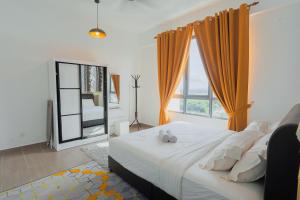 a bedroom with a bed and a large window at AAIRA Troika Residence,Kota Bharu in Kota Bharu