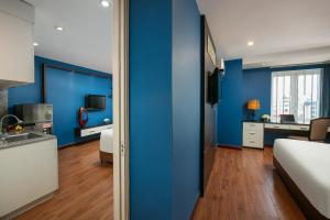 Ένα ή περισσότερα κρεβάτια σε δωμάτιο στο Hanoi 20 Hotel & Apartment