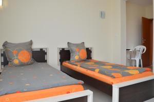 Postel nebo postele na pokoji v ubytování Zafo Hotel