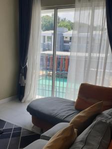 Χώρος καθιστικού στο Cyberia Crescent Cyberjaya -3 Bedroom 8 pax +1 φωτογραφίες