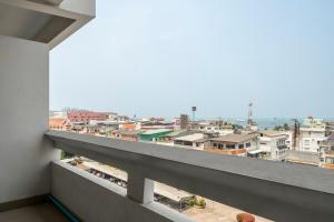 a view of a city from a balcony at Welcome Plaza Hotel Pattaya in Pattaya Central
