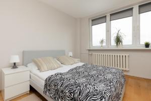 Postel nebo postele na pokoji v ubytování Spacious Apartment Perfect for Families by Renters