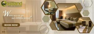 a picture of a hotel room with a bed and a mirror at Eastland Hotel And Residences in Cebu City