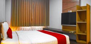 Voodi või voodid majutusasutuse Valore Hotel toas
