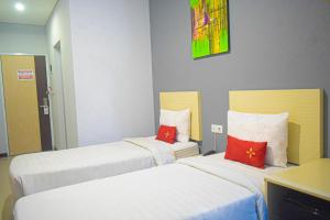 Voodi või voodid majutusasutuse Valore Hotel toas