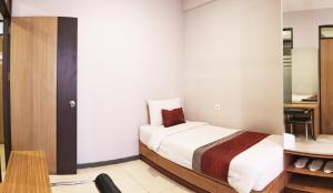 Voodi või voodid majutusasutuse Valore Hotel toas