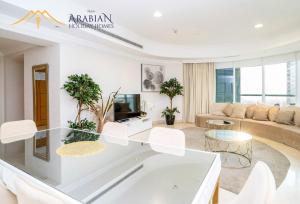 Posezení v ubytování New Arabian Trident Waterfront 3 BR plus maid
