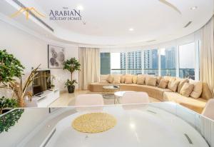 Posezení v ubytování New Arabian Trident Waterfront 3 BR plus maid