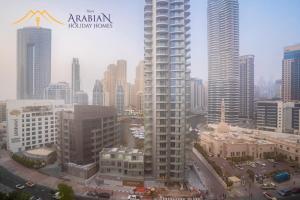 Nespecifikovaný výhled na destinaci Dubaj nebo výhled na město při pohledu z apartmánu