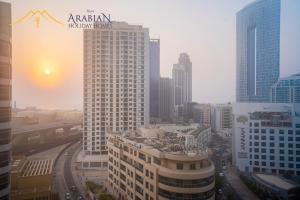 Nespecifikovaný výhled na destinaci Dubaj nebo výhled na město při pohledu z apartmánu