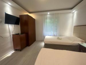 En eller flere senge i et værelse på Monteur- und Urlaubsunterkünfte