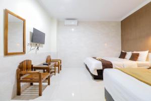 Katil atau katil-katil dalam bilik di Hotel Safara Yogyakarta