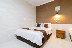 Katil atau katil-katil dalam bilik di Hotel Safara Yogyakarta