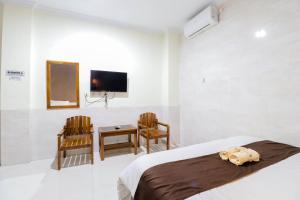 Katil atau katil-katil dalam bilik di Hotel Safara Yogyakarta
