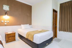 Katil atau katil-katil dalam bilik di Hotel Safara Yogyakarta