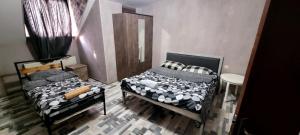 Postel nebo postele na pokoji v ubytování Kiev hotel