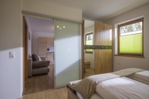 Ένα ή περισσότερα κρεβάτια σε δωμάτιο στο Appartement Anna Maria +4 φωτογραφίες