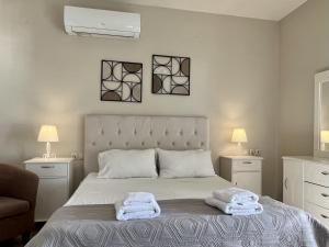 A bed or beds in a room at Villa Penelope Spartia Kefalonia