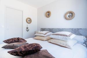 Postel nebo postele na pokoji v ubytování Guesthouse Le Mas de Cotignac
