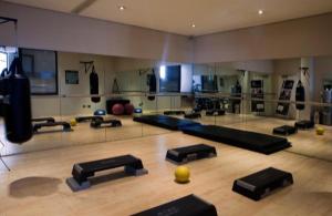 a bowling alley with black mats on the floor at Luxurious apartments in Johannesburg
