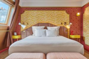 Ένα ή περισσότερα κρεβάτια σε δωμάτιο στο Idol Hotel +56 φωτογραφίες