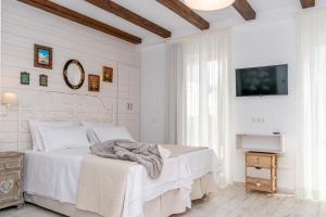 Casa Del Patio - Boutique Apartments客房内的一张或多张床位